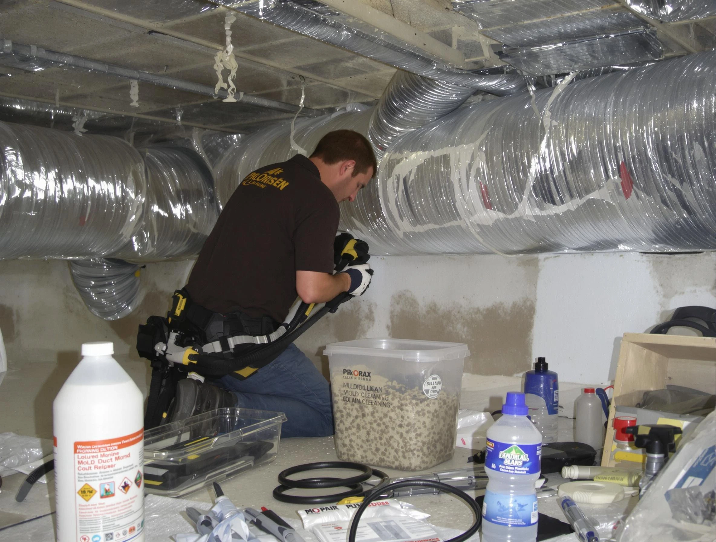 Williamsburg Air Duct Cleaning specialist performing professional mold removal from air ducts in Williamsburg